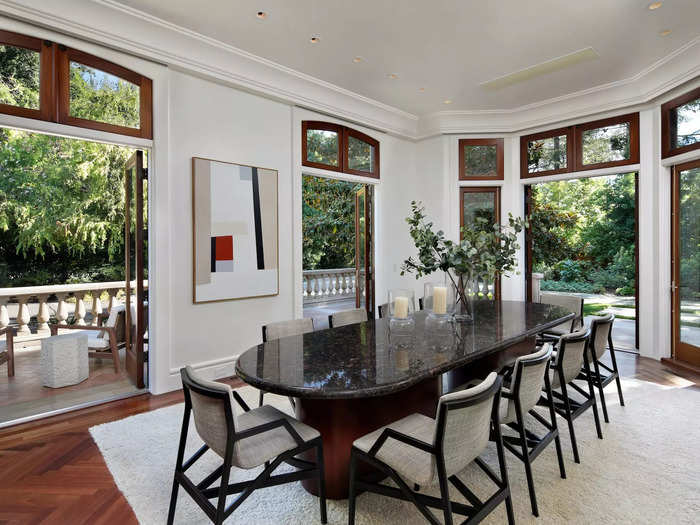 The home features a neutral color palette with American cherry and light oak floors. 