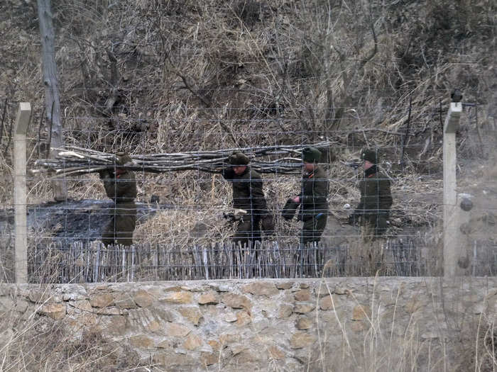 North Korean soldiers working on the border.