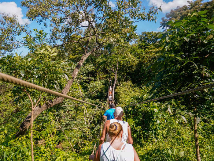 And when I was finally doing the cool thing I booked, like walking across a suspension bridge amid the treetops, my view was sometimes blocked once more by everyone else who booked the tour, too.