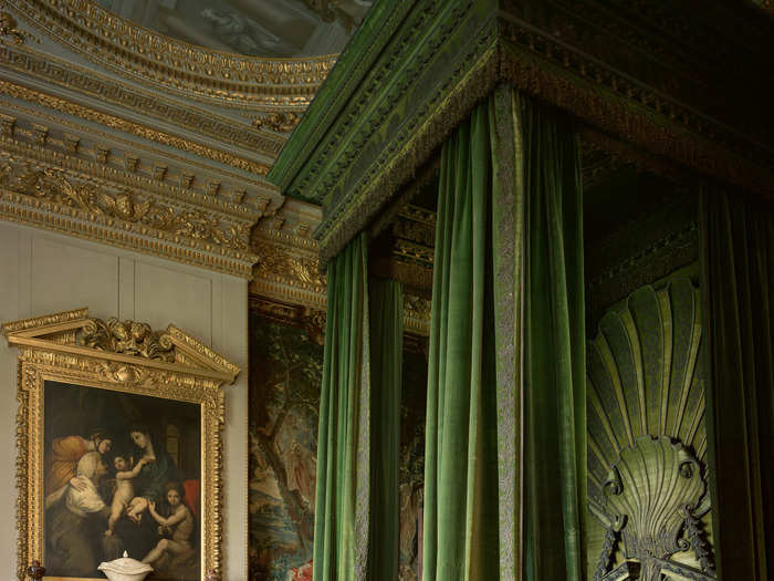 The Green Velvet Bedroom features a bed with a shell headboard referencing Venus, the Roman goddess of love.