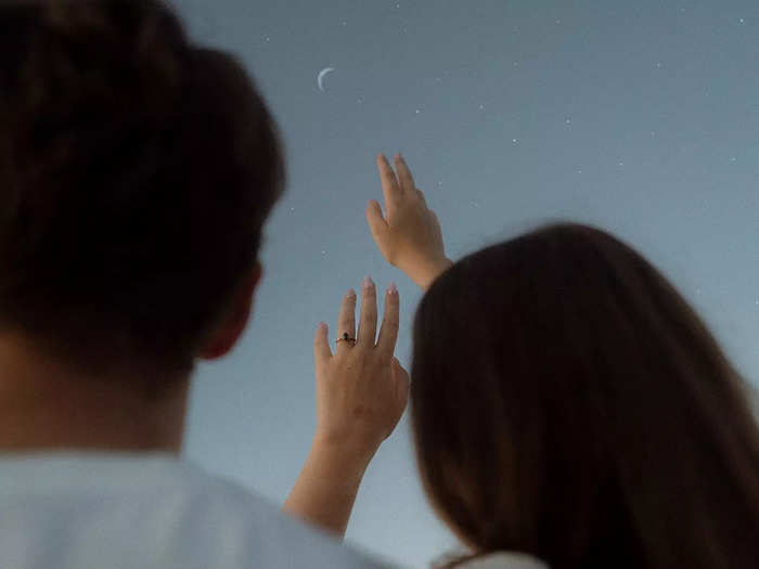 A couple reaches for the stars in Comox, Canada.