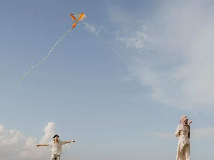 A Singapore couple celebrated their upcoming nuptials by flying a kite.