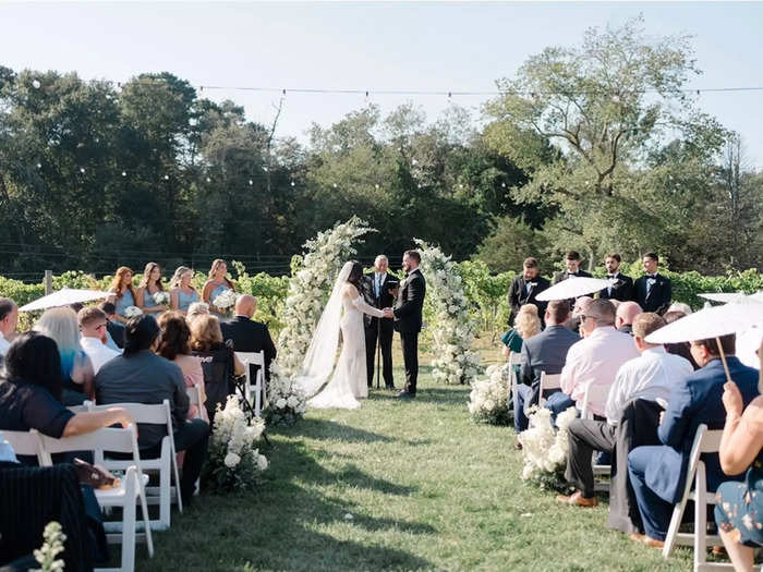 Julia and Mark hired an officiant, but they said private vows, too.