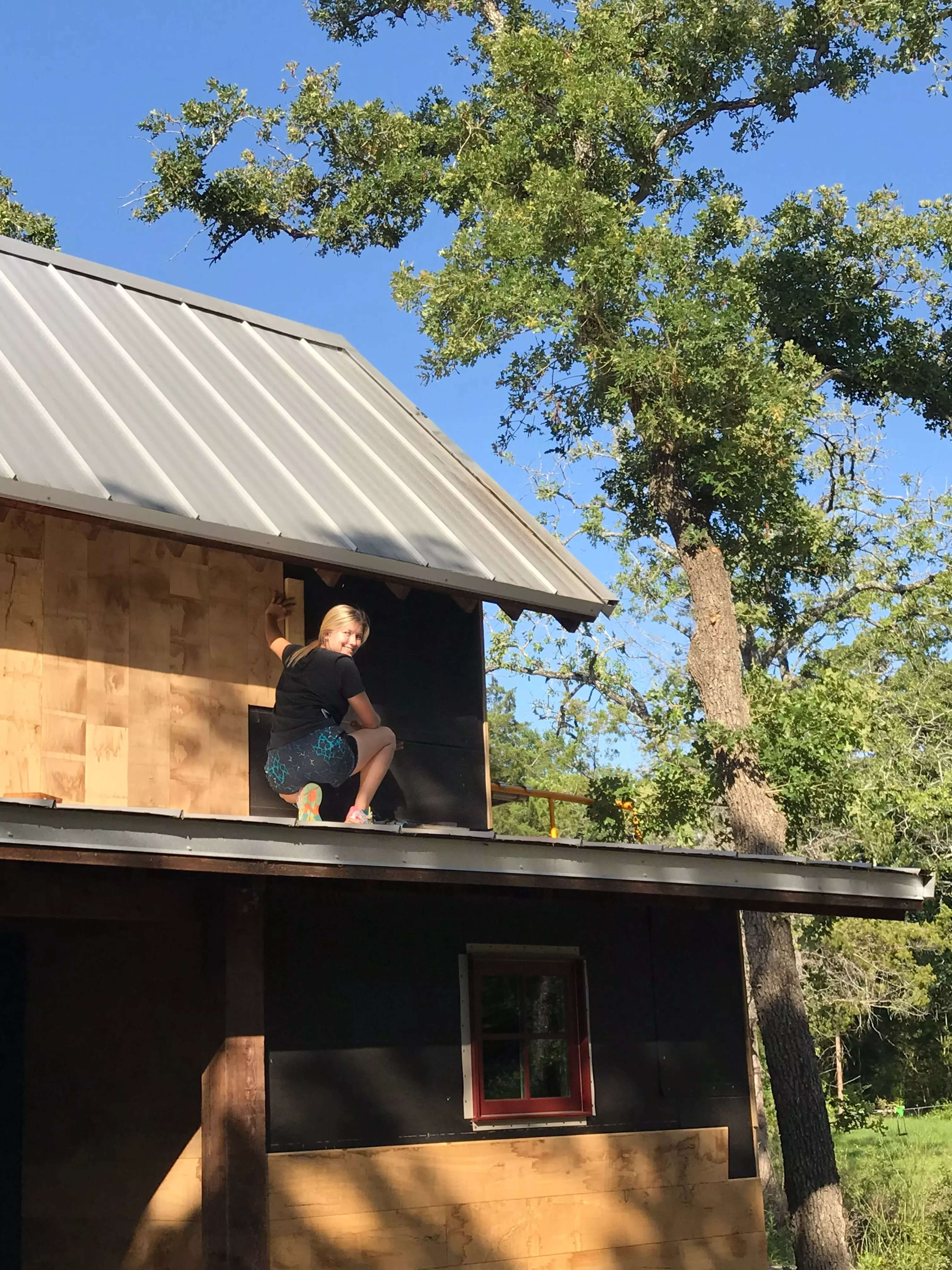 Mckean Matson building her tiny home.
