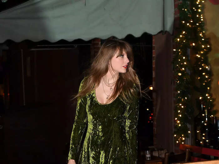 Continuing to mix brown and green pieces, Swift later wore an outfit worth at least $4,645.