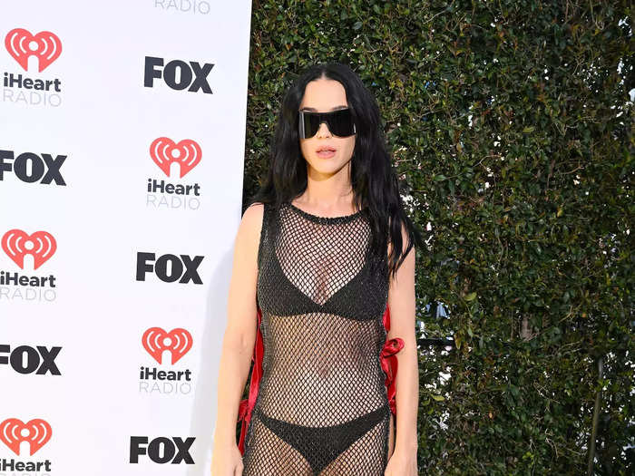 Katy Perry opted for a barely-there dress and thick accessories, but they didn