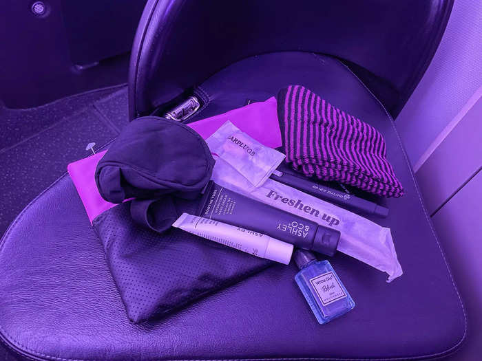 A goodie bag of supplies for a long-haul flight was waiting in my seat.