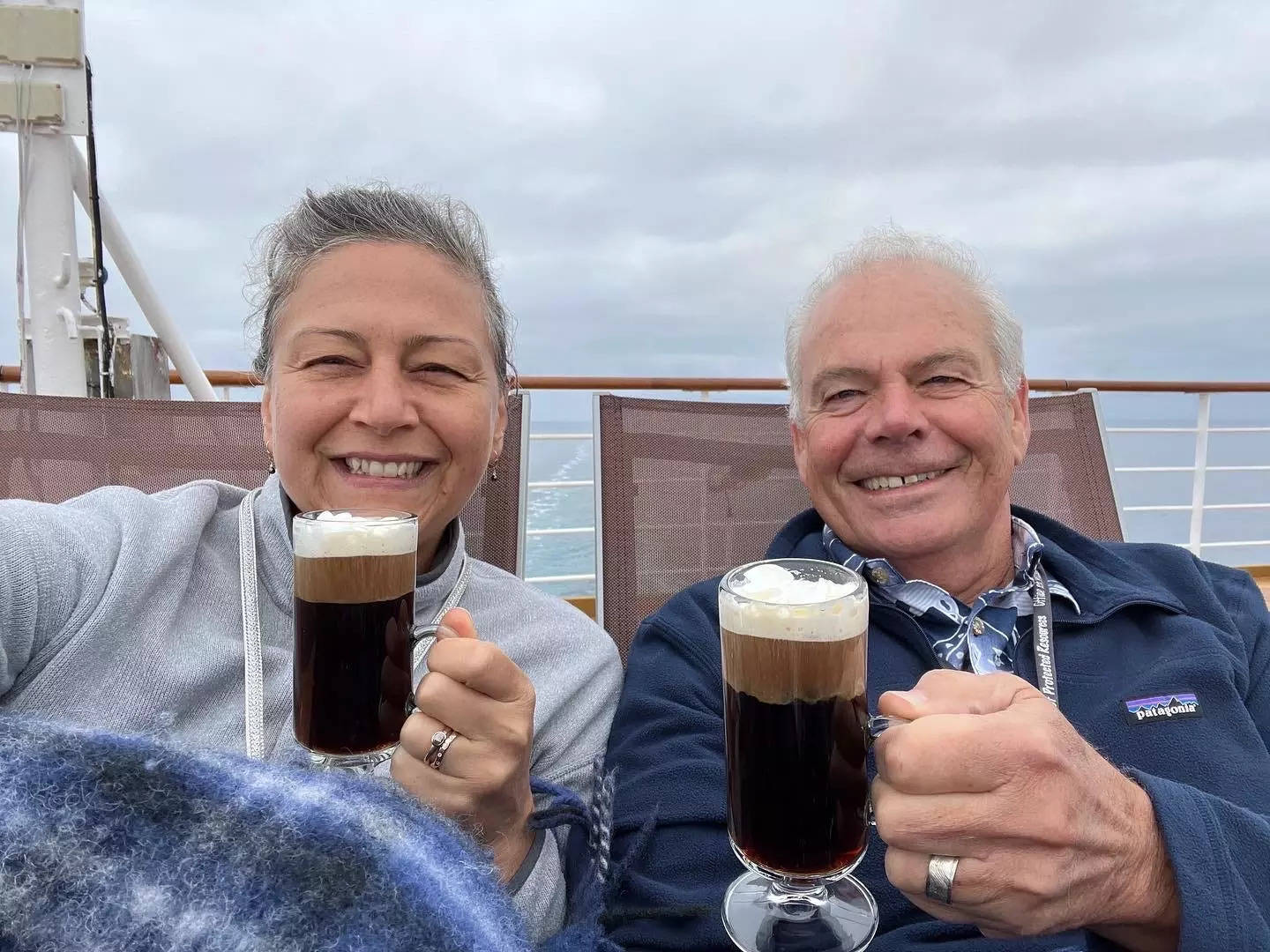 Author Rebecca Reuter and her husband with Mexican coffee in Alaska on a cruise ship
