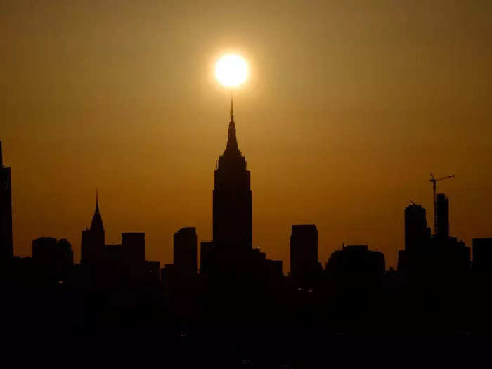 At sunrise on the morning of April 8, photographer Gary Hershorn captured the sun rising above the Empire State Building in New York City.