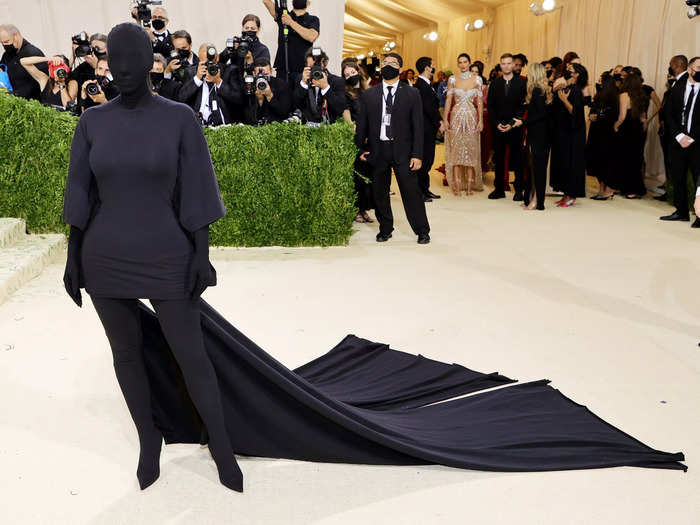 Kim Kardashian covered her face for the same red carpet, making it difficult to see everyone around her.