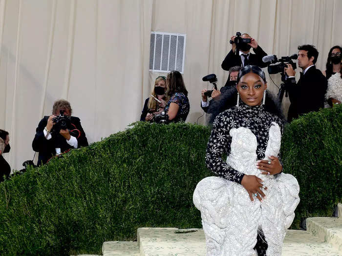 In 2021, Simone Biles carried 88 pounds up the Met Gala stairs in the form of a crystal-covered gown.