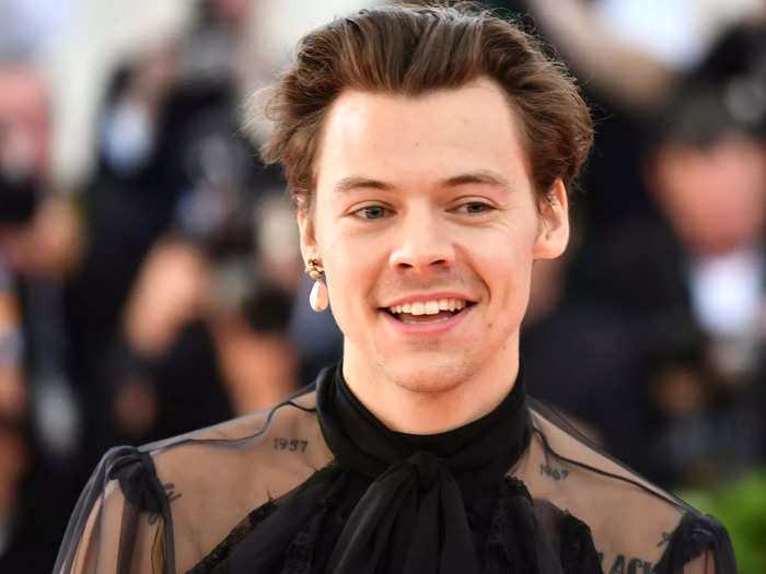 That same year, Harry Styles pierced one ear so he could accessorize his sheer outfit.