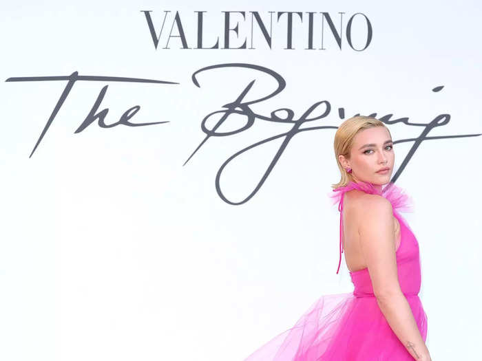Florence Pugh has defended the see-through, hot-pink gown she wore at a 2022 Valentino fashion show on numerous occasions.