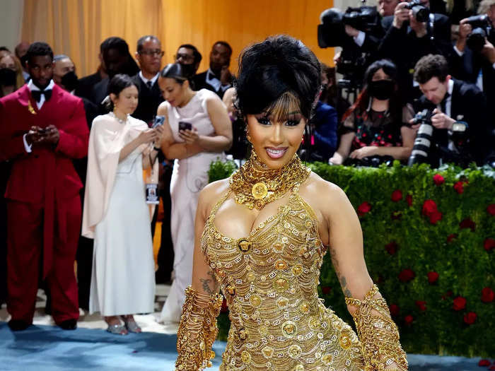 Cardi B was dripping in gold and diamonds at the 2022 Met Gala, and she said the bold look made her feel like a woman.