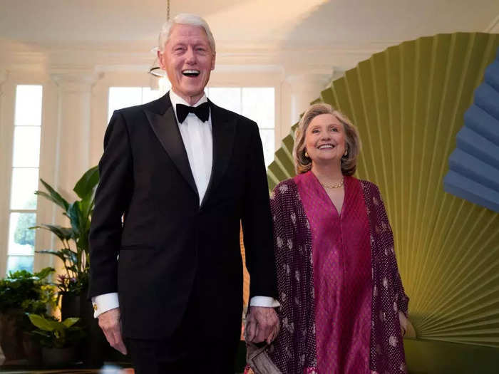 Hillary Clinton wore a pink caftan reminiscent of a Japanese kimono.