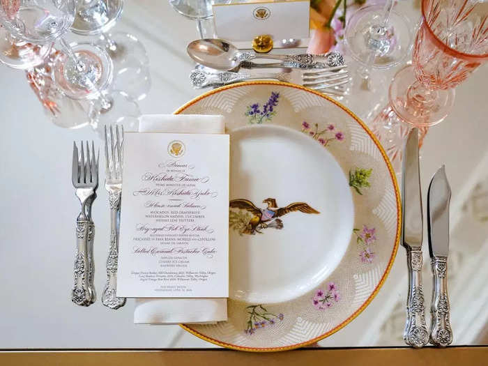 Dinner was served on china sets designed by Lady Bird Johnson and Laura Bush.