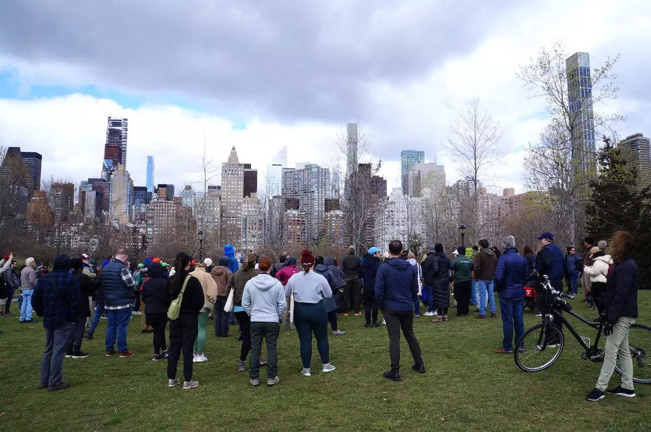 Volunteers and supporters gather in Southpoint Park on Roosevelt Island for a ceremony before planting a pocket forest on April 6, 2024.
