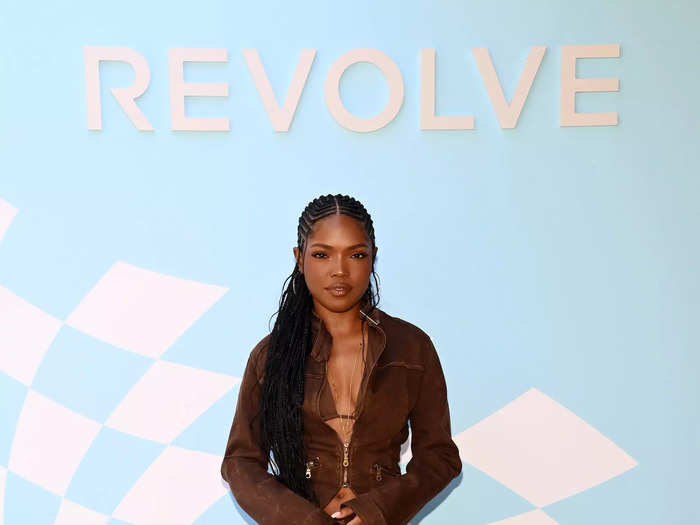 Ryan Destiny rocked a skirt with a thigh-high slit at Revolve Fest.