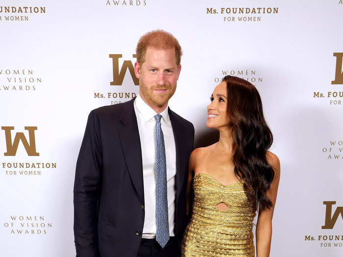 The duchess wore a more daring look than she had in recent years at an awards ceremony in May 2023. Her gold midi dress from Oritz had a strapless neckline, a slit on the skirt, and a cutout in the center of the bodice.