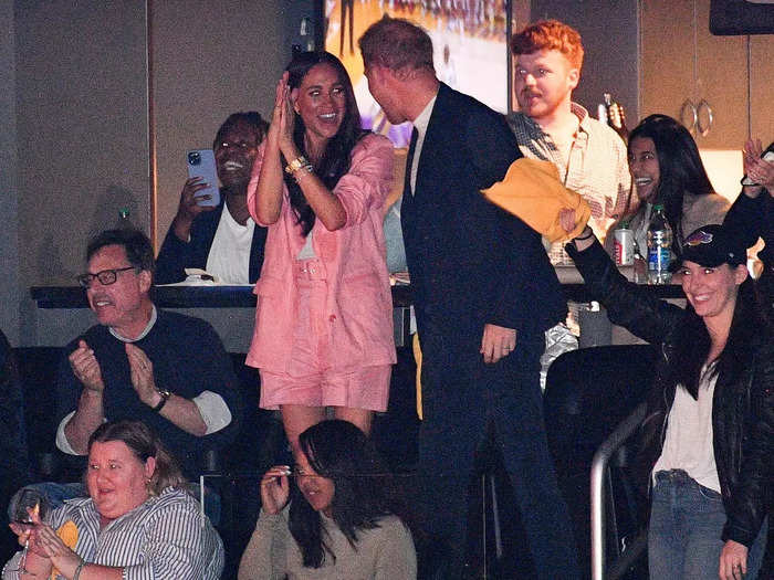 Meghan went for a more casual look at a Lakers game in April 2023, wearing a pair of pink shorts with a matching blazer and a white top.