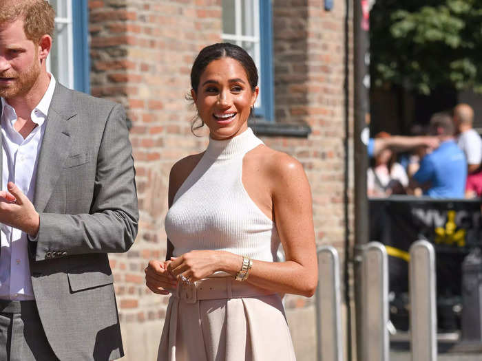 In September 2022, Meghan paired high-waisted trousers from Brandon Maxwell with a halter tank top from Anine Bing, which showed more of her shoulders than she typically did when she was a senior royal.