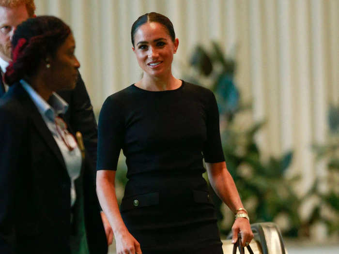 But at a United Nations event just a month later in July, Meghan again seemed to shift her style, rocking a fashion-forward ensemble. She paired a quarter-length black shirt with a black pencil skirt from Givenchy.