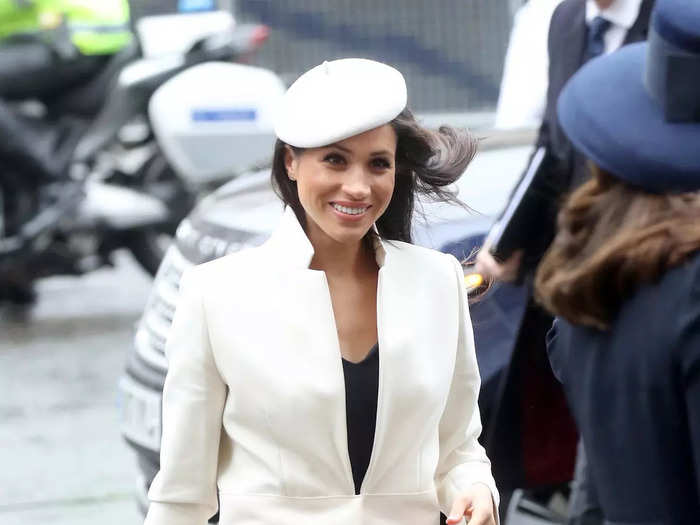 As her wedding got closer, Meghan more firmly established her chic royal style. At the Commonwealth Day ceremony in March 2018, she wore a knee-length Amanda Wakeley dress with a structured white coat and a matching white beret from Stephen Jones.