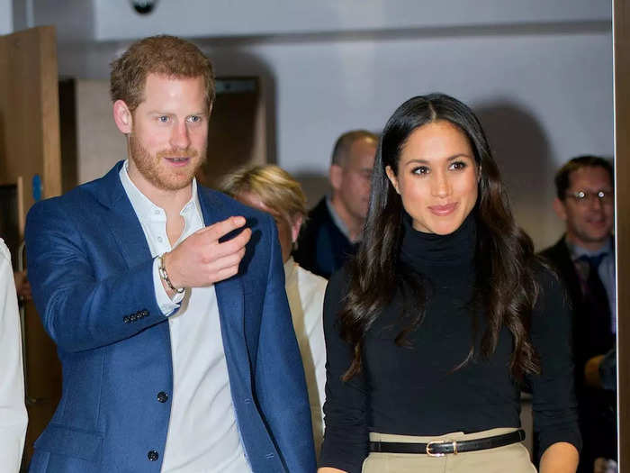 Harry and Meghan went to Nottingham shortly after their engagement in December, and Meghan opted for a much more buttoned-up look than she had worn in previous years. She paired a black turtleneck with a long tan skirt and black boots.