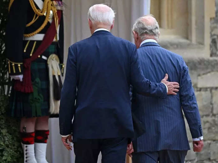 Biden appeared to break royal etiquette rules by touching the king