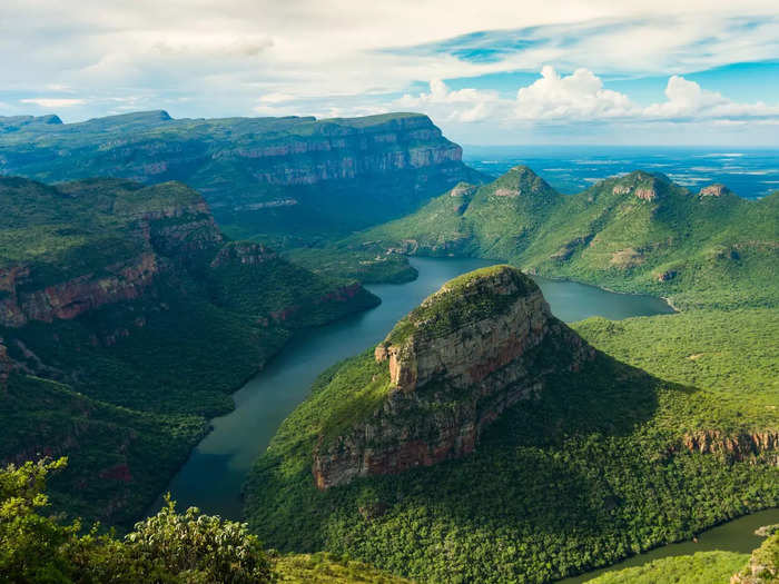 The Blyde River Canyon in South Africa is known for its unique geology, including the Pinnacle, a looming quartzite column.