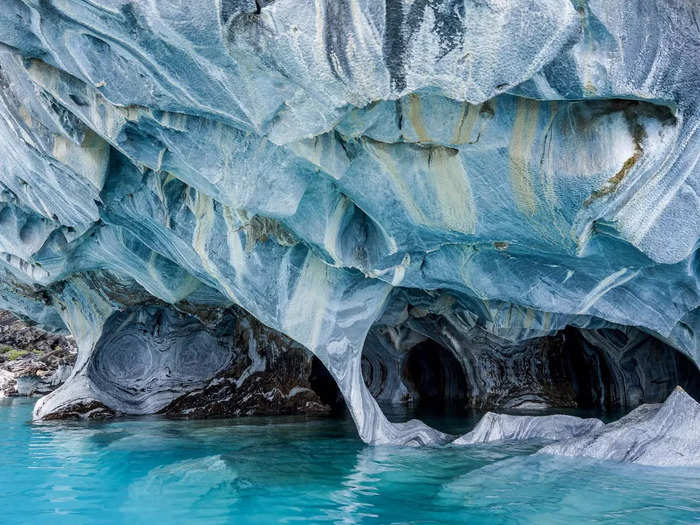 The stunning colors of the Marble Caves in Chile vary as water levels fluctuate throughout the year.