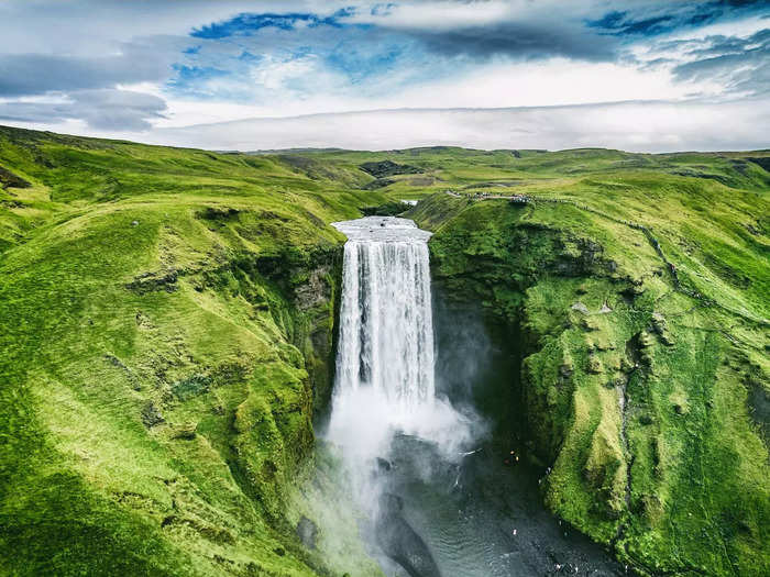 At Skógafoss in Skógar, Iceland, the heavy amount of spray that the waterfall produces makes a sunny-day rainbow sighting very likely.