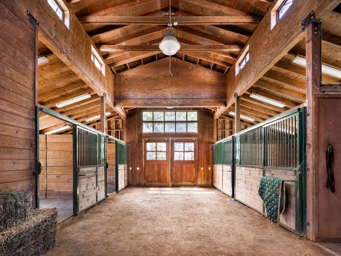 In addition to a hay barn and dairy barn, the property includes a 7-stall horse barn. 