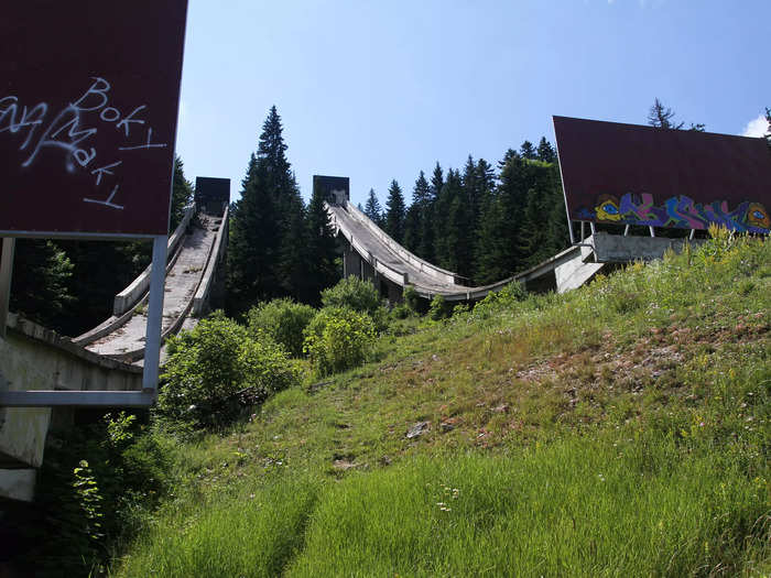 Decades later, many of the tracks and venues are still empty and abandoned, like these ski jumps at Mount Igman.