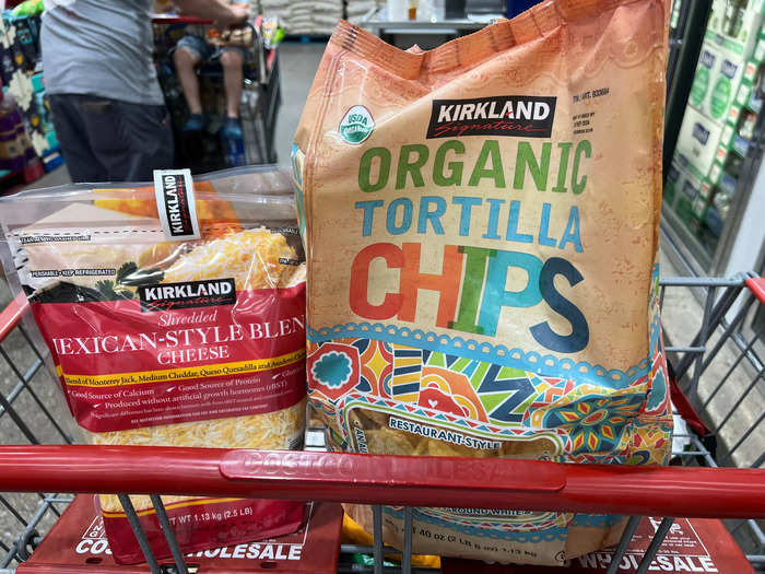 I always keep Kirkland Signature organic tortilla chips and Mexican-style shredded cheese on hand.