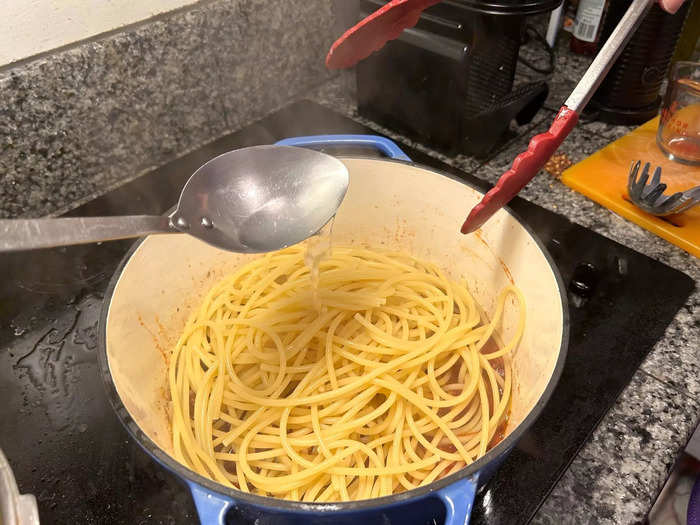 I cooked everything over low heat for two minutes, stirring my noodles with the tongs.