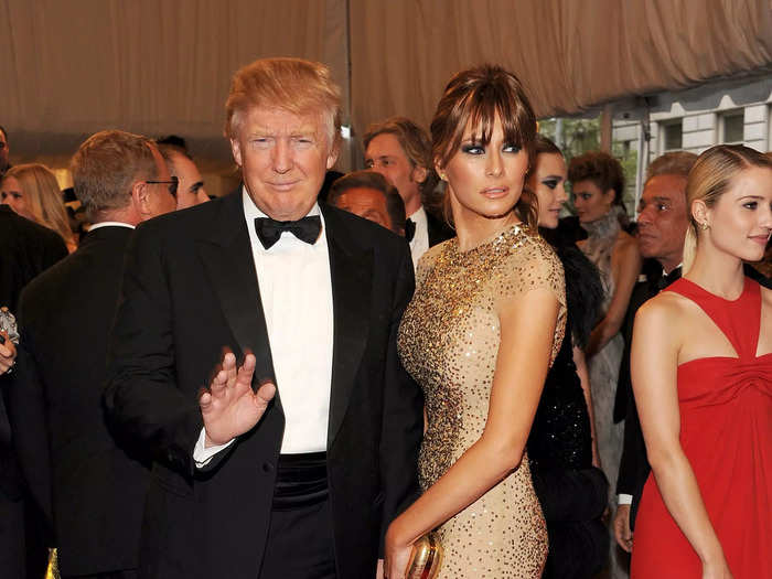 Melania sparkled in a gold Reem Acra dress at the 2011 Met Gala honoring Alexander McQueen.