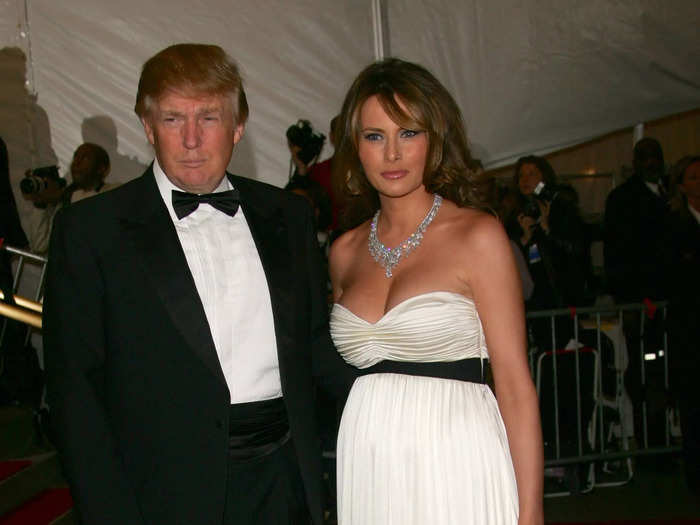 While pregnant with their son, Barron, in 2006, Melania Trump wore a white empire-waist dress with a black sash.