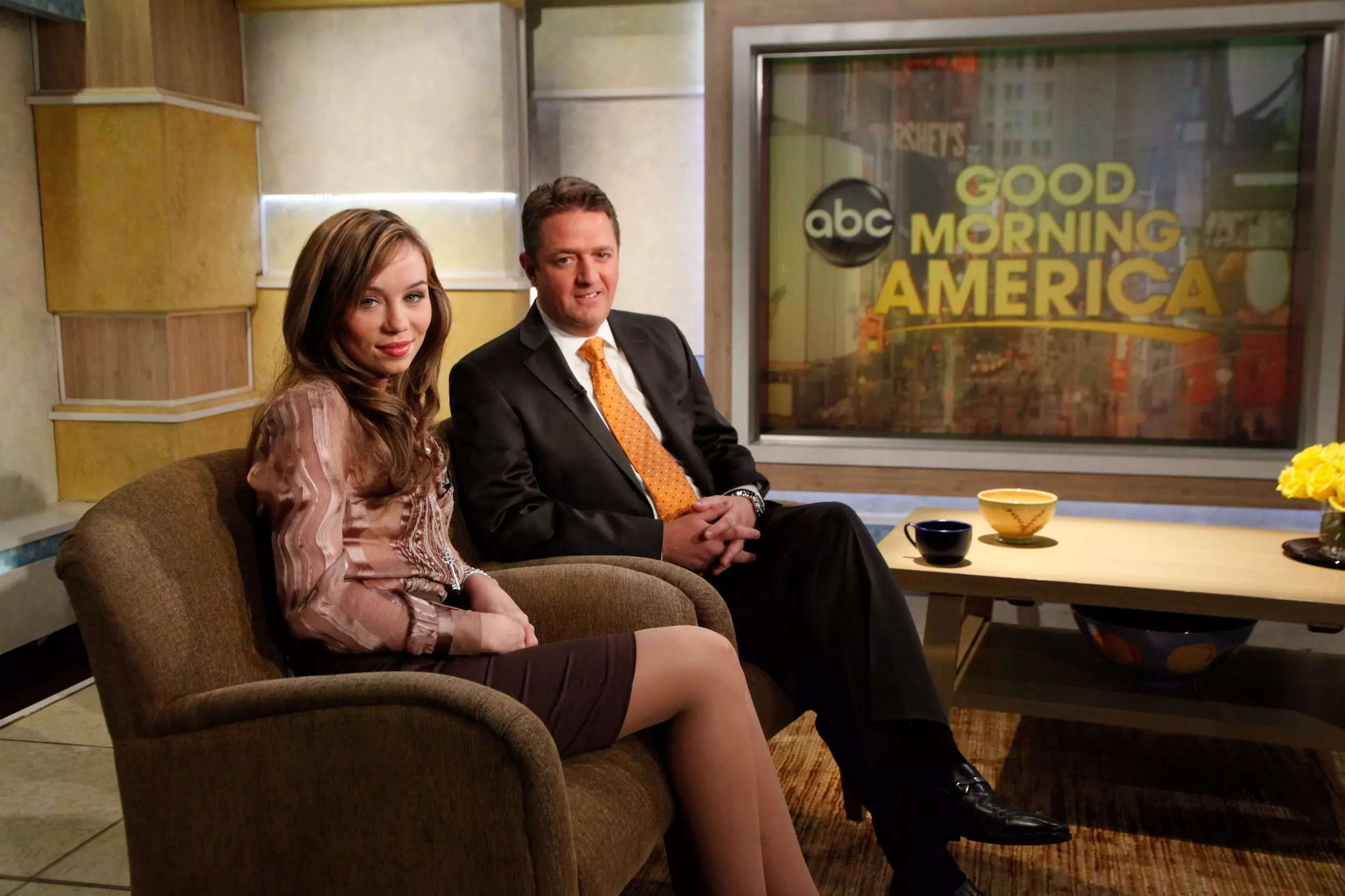 Capri Anderson and Keith Davidson on the set of Good Morning America in 2010.