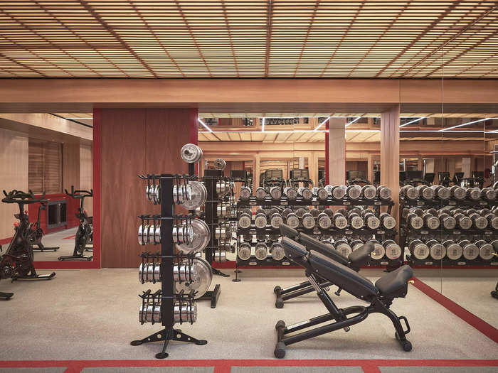 The second floor of the wellness retreat features a traditional gym space and yoga studio.