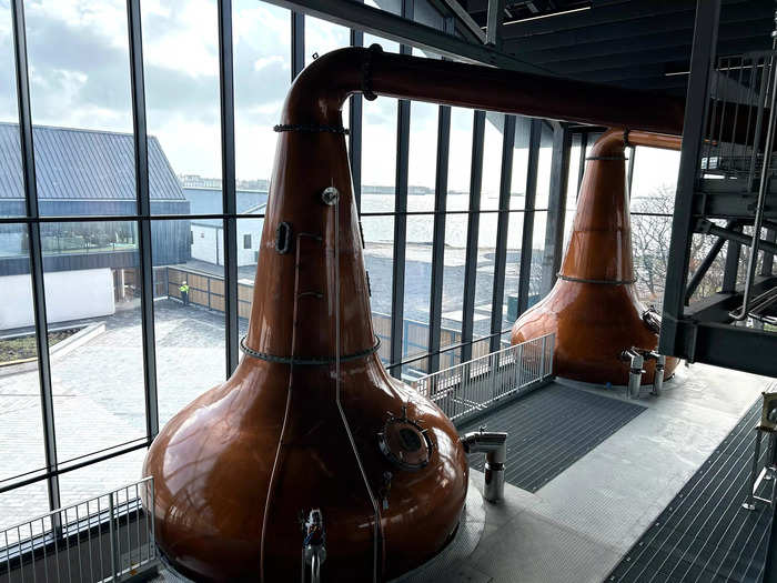 Over in the distillery, these copper stills are used to produce the classic Port Ellen-style whisky  
