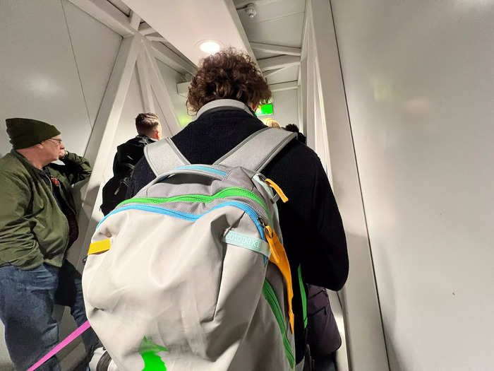 I had priority boarding because it came with booking the larger carry-on option. Nobody seemed to care how big the bags were. Several people seemed to have backpacks much larger than mine as well as their carry-on suitcase.