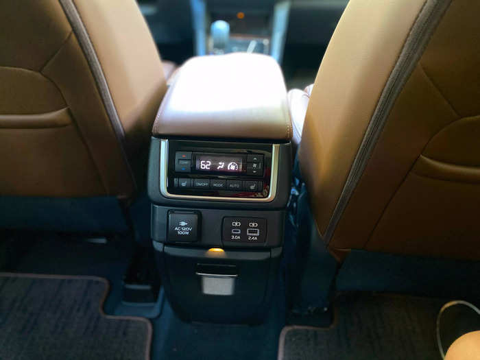 Passengers in the back have their own climate controls, USB-C and USB-A charging plugs, as well as a 120V AC plug. 