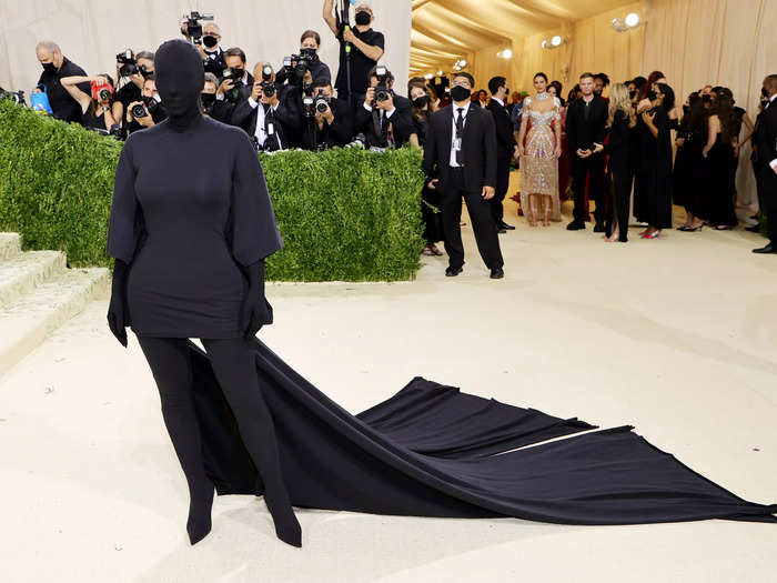 Kim turned heads at the 2021 event in a Balenciaga ensemble that covered her entire face and body.