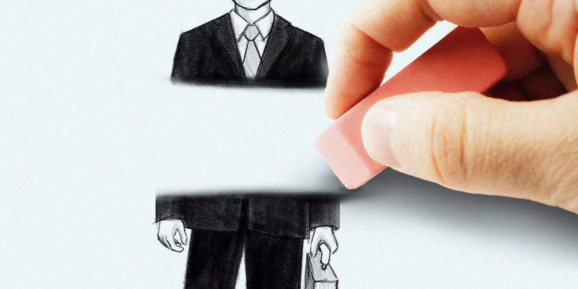Eraser erasing a drawing of a person in a suit