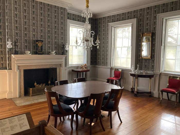 The dining room featured a replica of the original patterned wallpaper that the Jumels sourced from France in 1825.