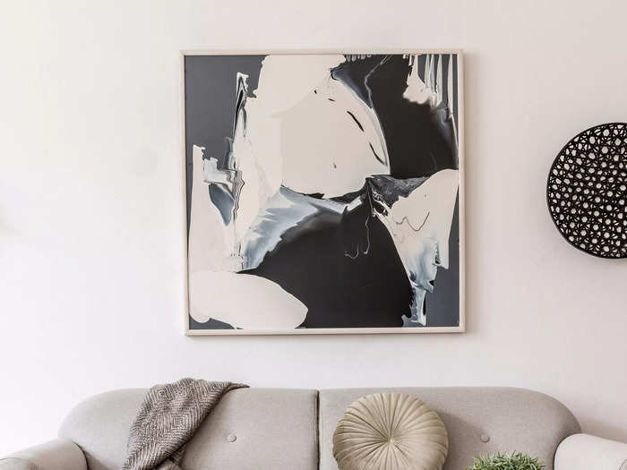 Start an art collection by swapping out your posters for real art pieces.