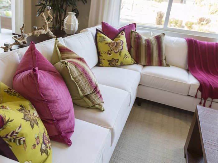 Swap out matching throw pillows for fresh patterns and designs.