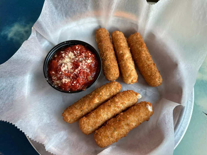 I started at Hooters and ordered cheese sticks as an appetizer.