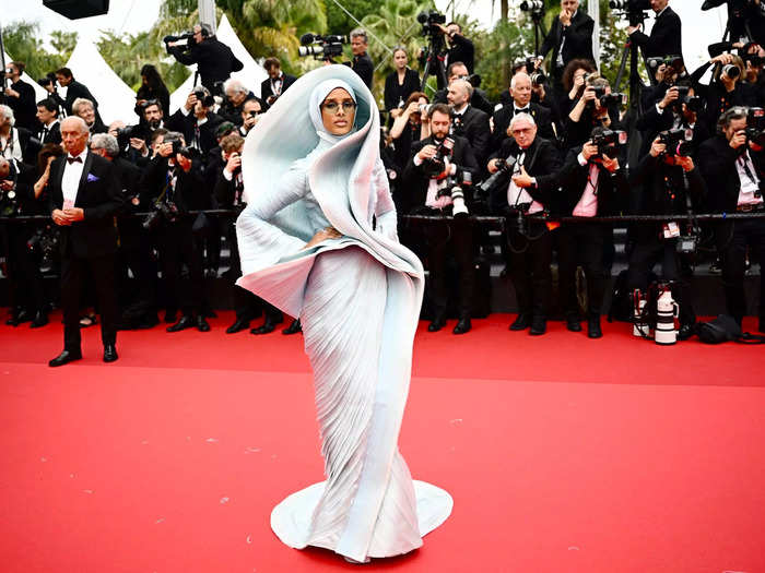 Rawdah Mohamed stood out in a sculptural gown that wrapped around her like a wave.